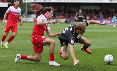 190926 - Accrington Stanley v Newport County - Sky Bet League 2 - Matty Jacob of Newport is grounded by Connor O'Brien of Accrington