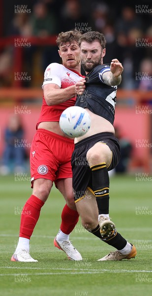 190926 - Accrington Stanley v Newport County - Sky Bet League 2 - Kyle Cameron of Newport is held back by Tyler Walton of Accrington
