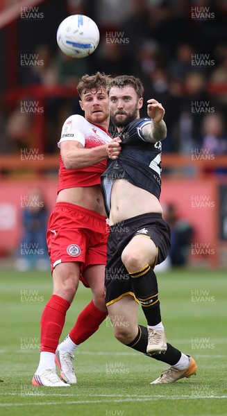 190926 - Accrington Stanley v Newport County - Sky Bet League 2 - Kyle Cameron of Newport is held back by Tyler Walton of Accrington