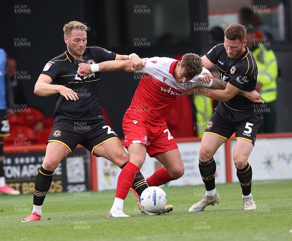 190926 - Accrington Stanley v Newport County - Sky Bet League 2 - Cameron Norman of Newport and Lee Jenkins of Newport contain Tyler Walton of Accrington