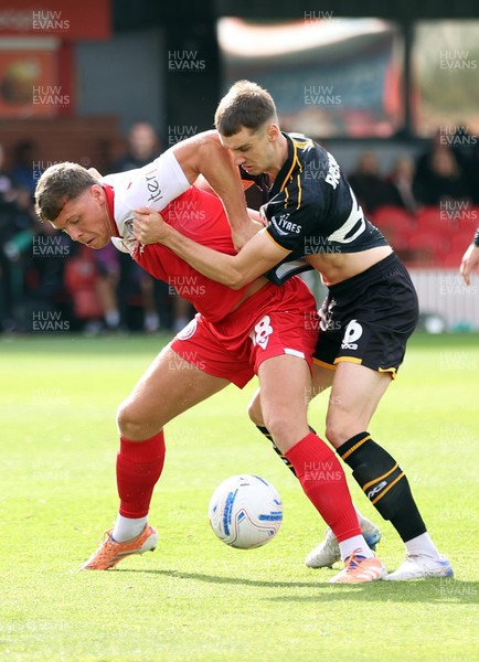 190926 - Accrington Stanley v Newport County - Sky Bet League 2 - Ciaran Brennan of Newport and Charlie Caton of Accrington