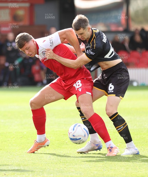 190926 - Accrington Stanley v Newport County - Sky Bet League 2 - Ciaran Brennan of Newport and Charlie Caton of Accrington