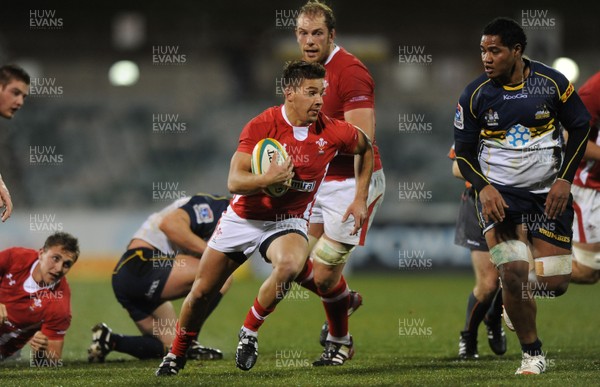 120612 - ACT Brumbies v Wales -Rhys Webb of Wales gets into space