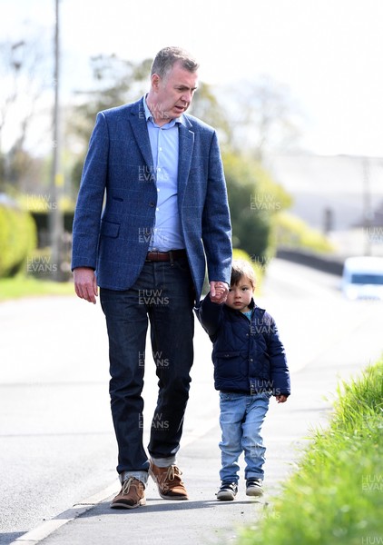 060521 -  Plaid Cymru leader Adam Price on his way to vote in the Senedd election with his son at his local polling station Pontargothi Memorial Hall, Pontargothi, Carmarthen