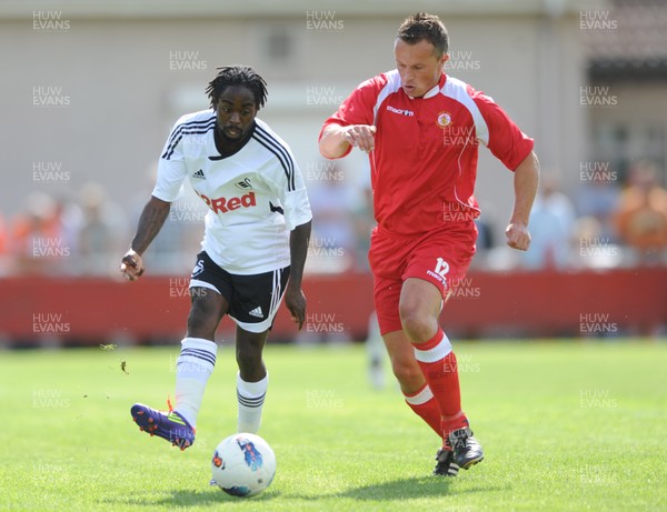 23.07.11 - Afan Lido v Swansea City - Preseason Friendly - Nathan Dyer of Swansea City and Chris Pridham of Afan Lido compete. 