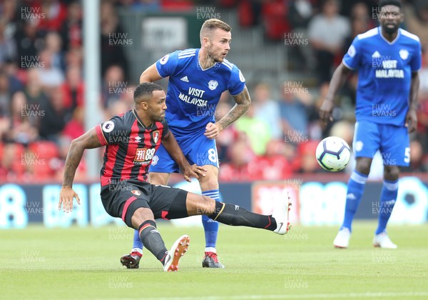 110818 - AFC Bournemouth v Cardiff City, Premier League - Joe Ralls of Cardiff City and Callum Wilson of Bournemouth compete for the ball