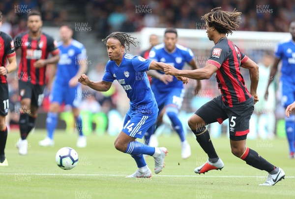 110818 - AFC Bournemouth v Cardiff City, Premier League - Bobby Reid of Cardiff City is challenged by Nathan Ake of Bournemouth