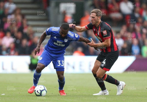 110818 - AFC Bournemouth v Cardiff City, Premier League - Junior Hoilett of Cardiff City takes on Dan Gosling of Bournemouth