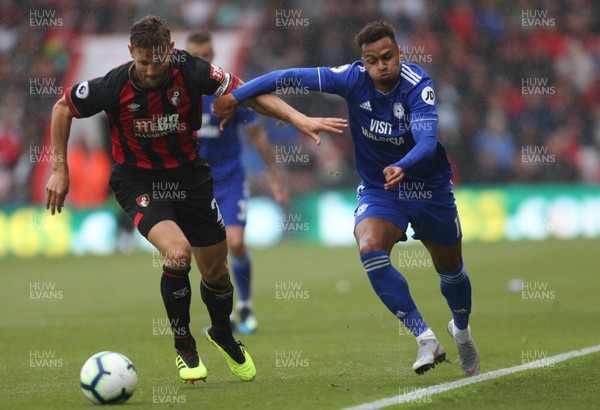 110818 - AFC Bournemouth v Cardiff City, Premier League - Josh Murphy of Cardiff City and Simon Francis of Bournemouth compete for the ball