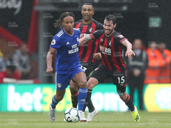 110818 - AFC Bournemouth v Cardiff City, Premier League - Bobby Reid of Cardiff City holds off Adam Smith of Bournemouth