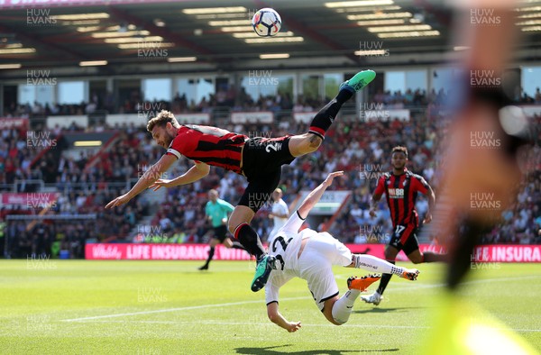 050518 - AFC Bournemouth v Swansea City - Premier League - Simon Francis of Bournemouth crashes over Connor Roberts of Swansea
