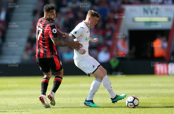 050518 - AFC Bournemouth v Swansea City - Premier League - Alfie Mawson of Swansea is tackled by Joshua King of Bournemouth