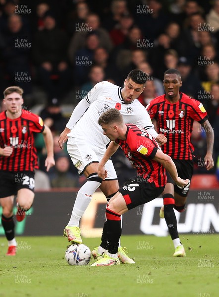 061121 - AFC Bournemouth v Swansea City, Sky Bet Championship - Joel Piroe of Swansea City and Gavin Kilkenny of Bournemouth compete for the ball