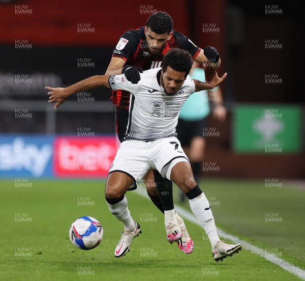 160321 - AFC Bournemouth v Swansea City - SkyBet Championship - Dominic Solanke of Bournemouth is tackled by Korey Smith of Swansea City