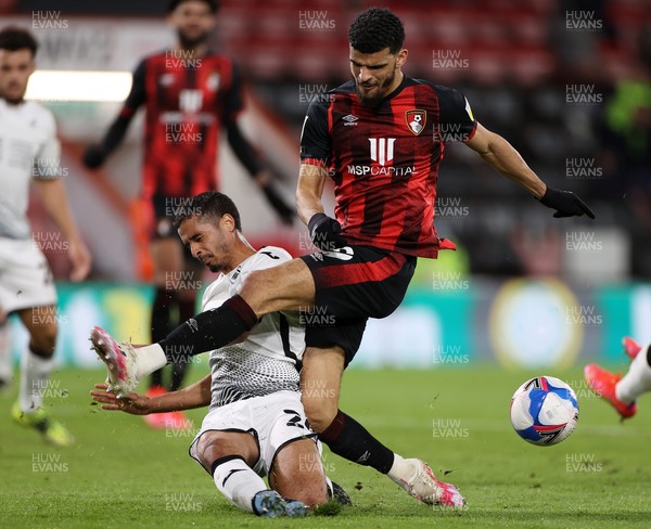 160321 - AFC Bournemouth v Swansea City - SkyBet Championship - Dominic Solanke of Bournemouth is tackled by Kyle Naughton of Swansea City in the box