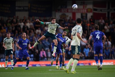 190825 - AFC Wimbledon v Cardiff City - Sky Bet League 1 - Joel Colwill of Cardiff City wins the header