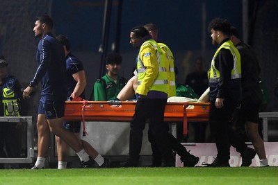 190825 - AFC Wimbledon v Cardiff City - Sky Bet League 1 - Ollie Tanner of Cardiff City is stretched off after picking up an injury