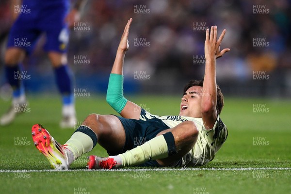 190825 - AFC Wimbledon v Cardiff City - Sky Bet League 1 - Joel Colwill of Cardiff City appeals after being tackled