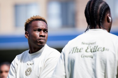 080826 - AFC Wimbledon v Newport County - Carabao Cup First Round - Shaquille Gwengwe of Newport County before the match