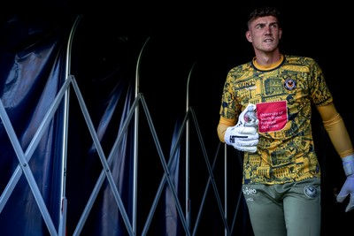 080826 - AFC Wimbledon v Newport County - Carabao Cup First Round - Jordan Wright of Newport County before the match