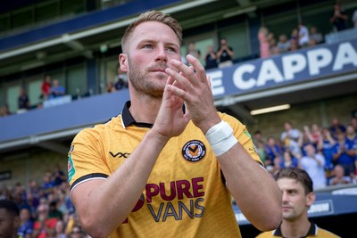 080826 - AFC Wimbledon v Newport County - Carabao Cup First Round - Cameron Norman of Newport County before the match