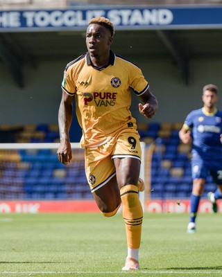080826 - AFC Wimbledon v Newport County - Carabao Cup First Round - Shaquille Gwengwe of Newport County in action