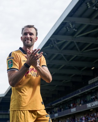 080826 - AFC Wimbledon v Newport County - Carabao Cup First Round - Christian Doidge of Newport County after the match