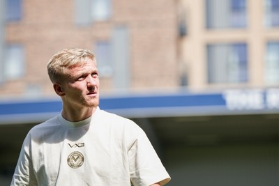 080826 - AFC Wimbledon v Newport County - Carabao Cup First Round - Matthew Smith of Newport County before the match