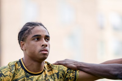 080826 - AFC Wimbledon v Newport County - Carabao Cup First Round - Moses Alexander-Walker of Newport County warming up