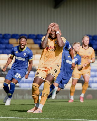 080826 - AFC Wimbledon v Newport County - Carabao Cup First Round - Shaquille Gwengwe of Newport County reacts after missing a penalty