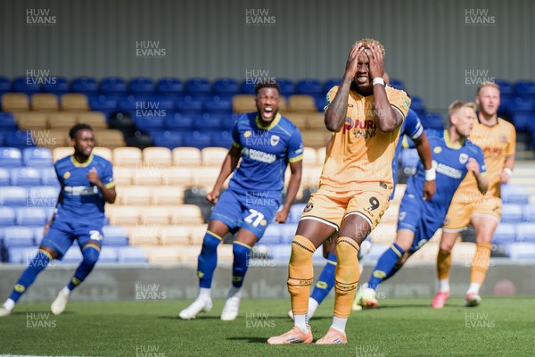 080826 - AFC Wimbledon v Newport County - Carabao Cup First Round - Shaquille Gwengwe of Newport County reacts after missing a penalty