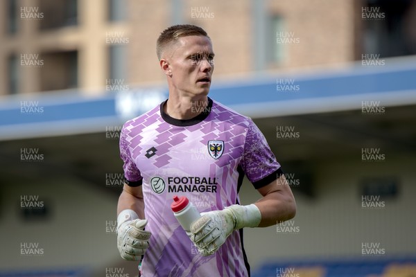 080826 - AFC Wimbledon v Newport County - Carabao Cup First Round - Nathan Bishop of AFC Wimbledon during the penalty shootout