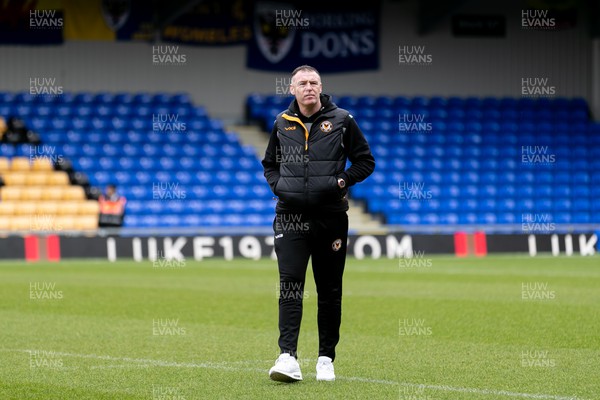 160324 - AFC Wimbledon v Newport County - Sky Bet League 2 - Graham Coughlan manager of Newport County AFC walks the pitch prior to the kick off