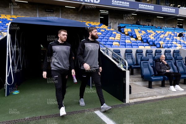 160324 - AFC Wimbledon v Newport County - Sky Bet League 2 - Players of Newport County AFC walk the pitch prior to the kick off