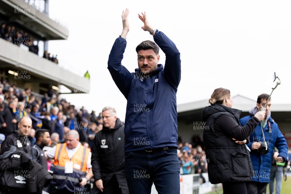 160324 - AFC Wimbledon v Newport County - Sky Bet League 2 - Johnnie Jackson manager of AFC Wimbledon applauds prior to the game