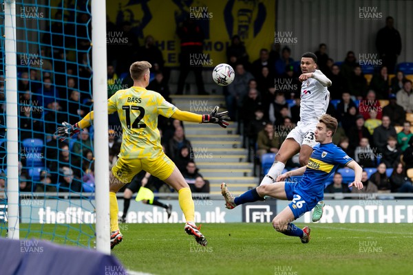 160324 - AFC Wimbledon v Newport County - Sky Bet League 2 - Kyle Jameson of Newport County AFC shoots to score his sides second goal