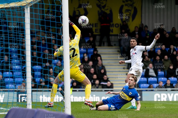 160324 - AFC Wimbledon v Newport County - Sky Bet League 2 - Kyle Jameson of Newport County AFC shoots to score his sides second goal