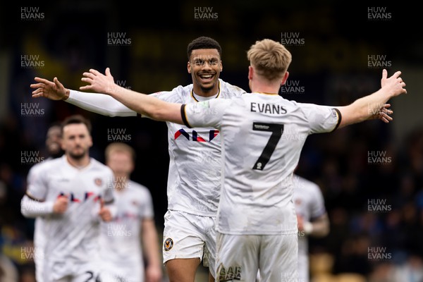 160324 - AFC Wimbledon v Newport County - Sky Bet League 2 - Kyle Jameson of Newport County AFC celebrates with Will Evans of Newport County AFC after scoring his sides second goal