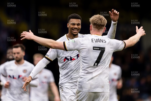 160324 - AFC Wimbledon v Newport County - Sky Bet League 2 - Kyle Jameson of Newport County AFC celebrates with Will Evans of Newport County AFC after scoring his sides second goal