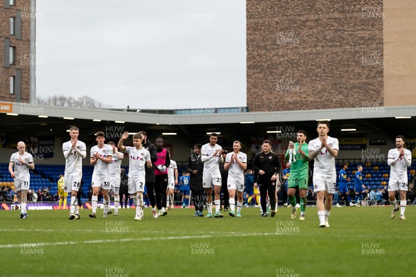 160324 - AFC Wimbledon v Newport County - Sky Bet League 2 - Players of Newport County AFC applaud the fans after their sides victory