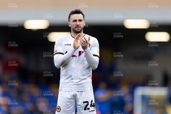 160324 - AFC Wimbledon v Newport County - Sky Bet League 2 - Aaron Wildig of Newport County AFC applauds the fans after their sides victory