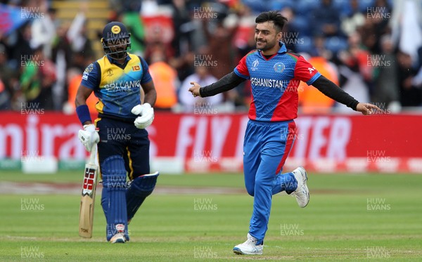 040619 - Afghanistan v Sri Lanka - ICC Cricket World Cup 2019 - Rashid Khan of Afghanistan celebrates as Kusal Perera is caught by Mohammad Shahzad