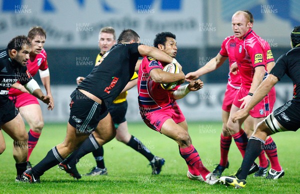 29.10.10 - Aironi v Cardiff Blues - Magners League Cardiff's Casey Laulala is tackled by Luca Redolfini of Aironi 