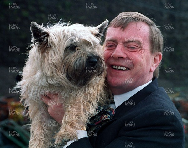 250594 - Derby horse owner Alan Davies with his dog Chickawacka at home in Merthyr