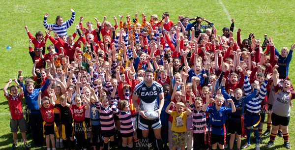 160512 -  Wales winger Alex Cuthbert who has re-signed for Cardiff Blues for next season, with children attending the Future Blues Schools Festival at Cardiff Arms Park