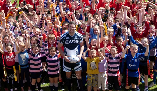 160512 -  Wales winger Alex Cuthbert who has re-signed for Cardiff Blues for next season, with children attending the Future Blues Schools Festival at Cardiff Arms Park