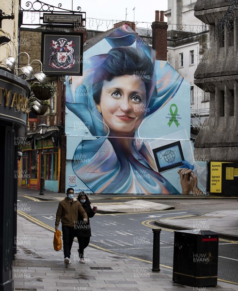 120321 - Picture shows a mural on Quay Street, Cardiff of Professor Alka Suraj Prakash Ahuja created for Mother’s Day The consultant child and adolescent psychiatrist, from Cardiff, will be appointed MBE for services to the NHS during the pandemic Having helped establish the NHS Wales Video Consulting Service