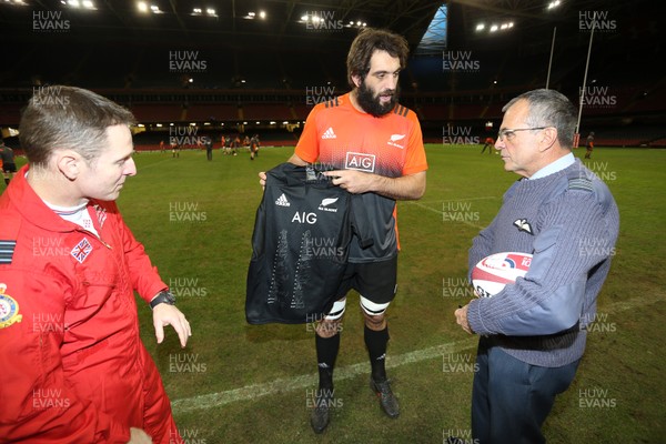 241117 - All Blacks Captains Run - Sam Whitelock presents a signed shirt to the RAF and Red Arrows