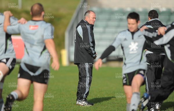 04.11.09 - New Zealand Rugby Training - Head Coach Graham Henry looks on during training. 