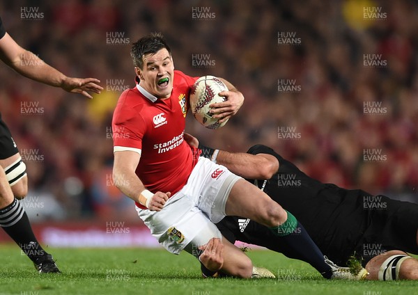 080717 - All Blacks v British & Irish Lions - Third Test - Johnny Sexton of British & Irish Lions is tackled by Sam Whitelock of New Zealand